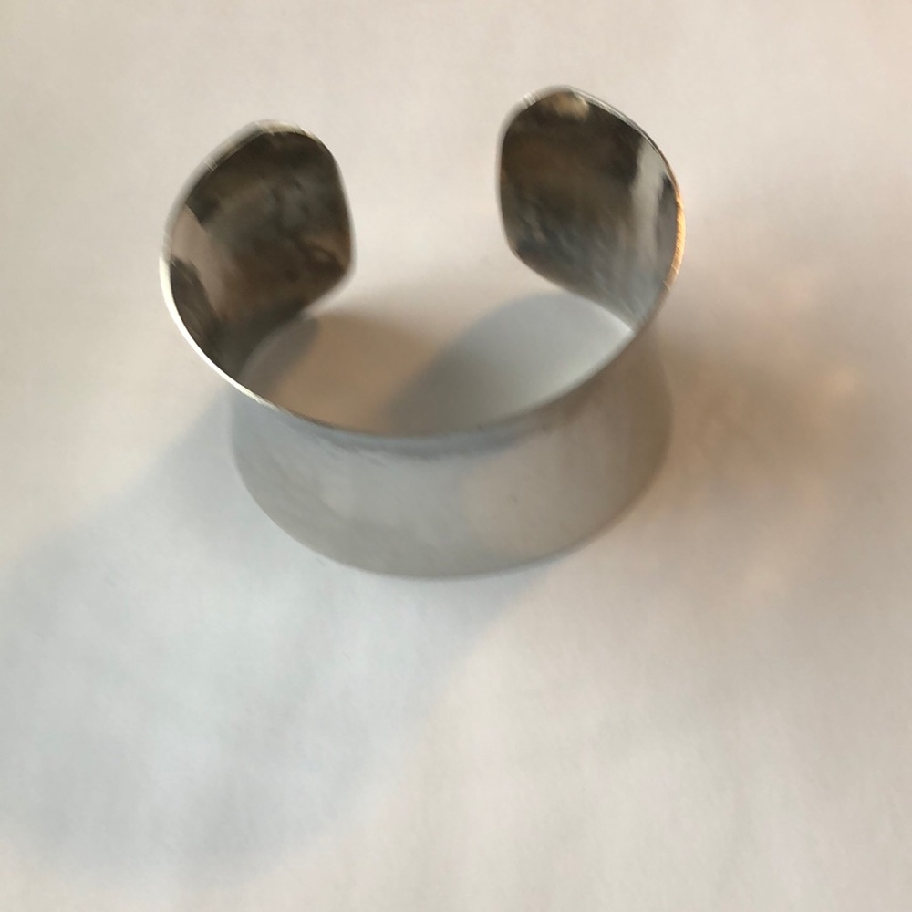Silver tone cuff bracelet